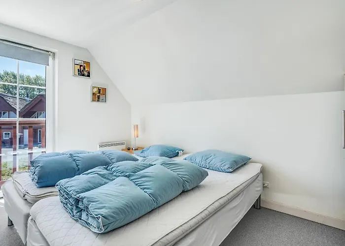 Three-bedroom In Hébergement de vacances Romo